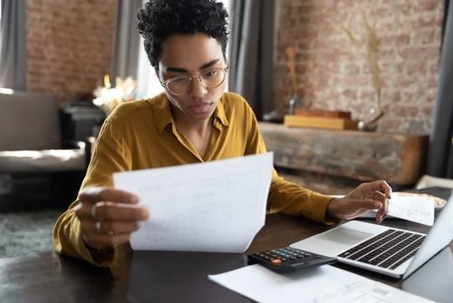 woman reviewing papers